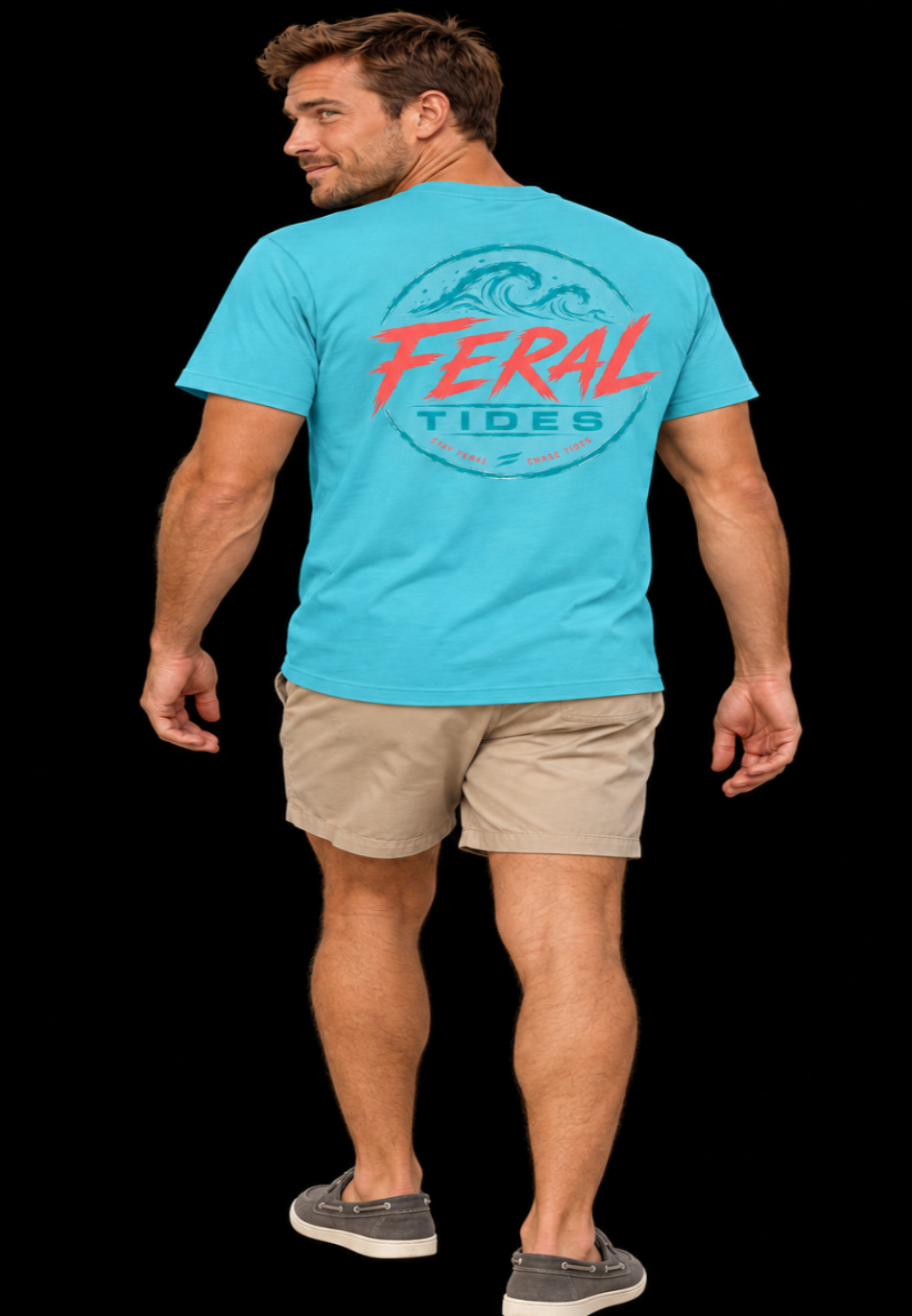 Male model wearing an aqua Tidal Rebel Tee, turning his back and looking over his left shoulder to show the coral and teal Feral Tides wave design, on a solid black background.